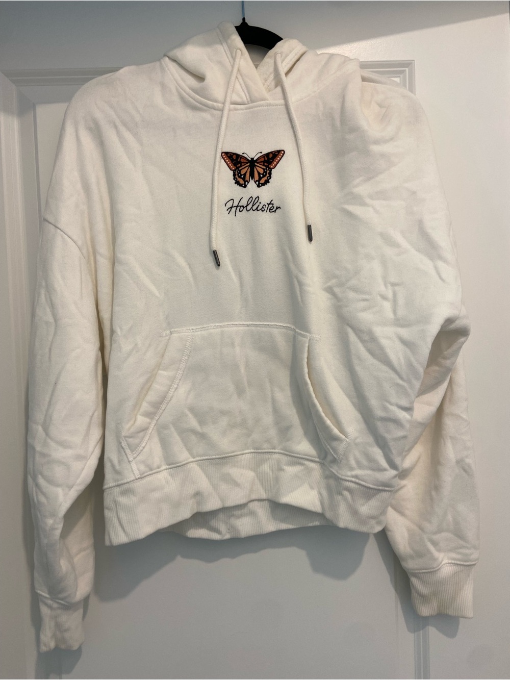 Hollister Ivory Hoodie with Embroidered Orange Butterfly
